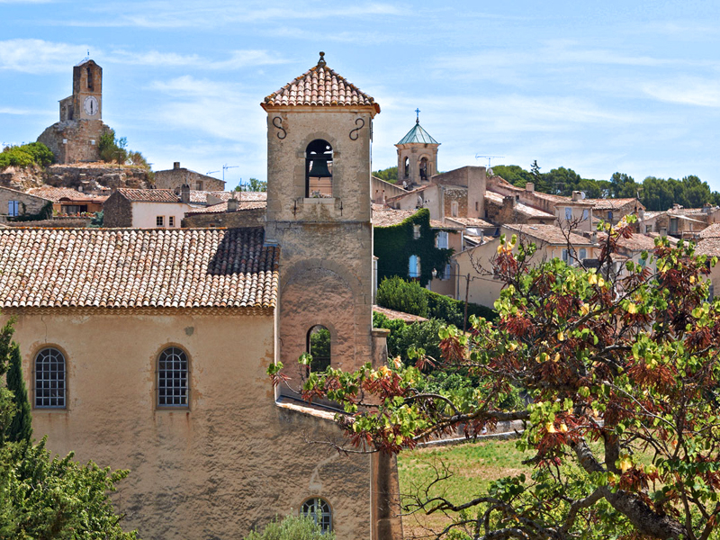 Centuries old houses in Provence, France, in traditional stone with terracotta roofing